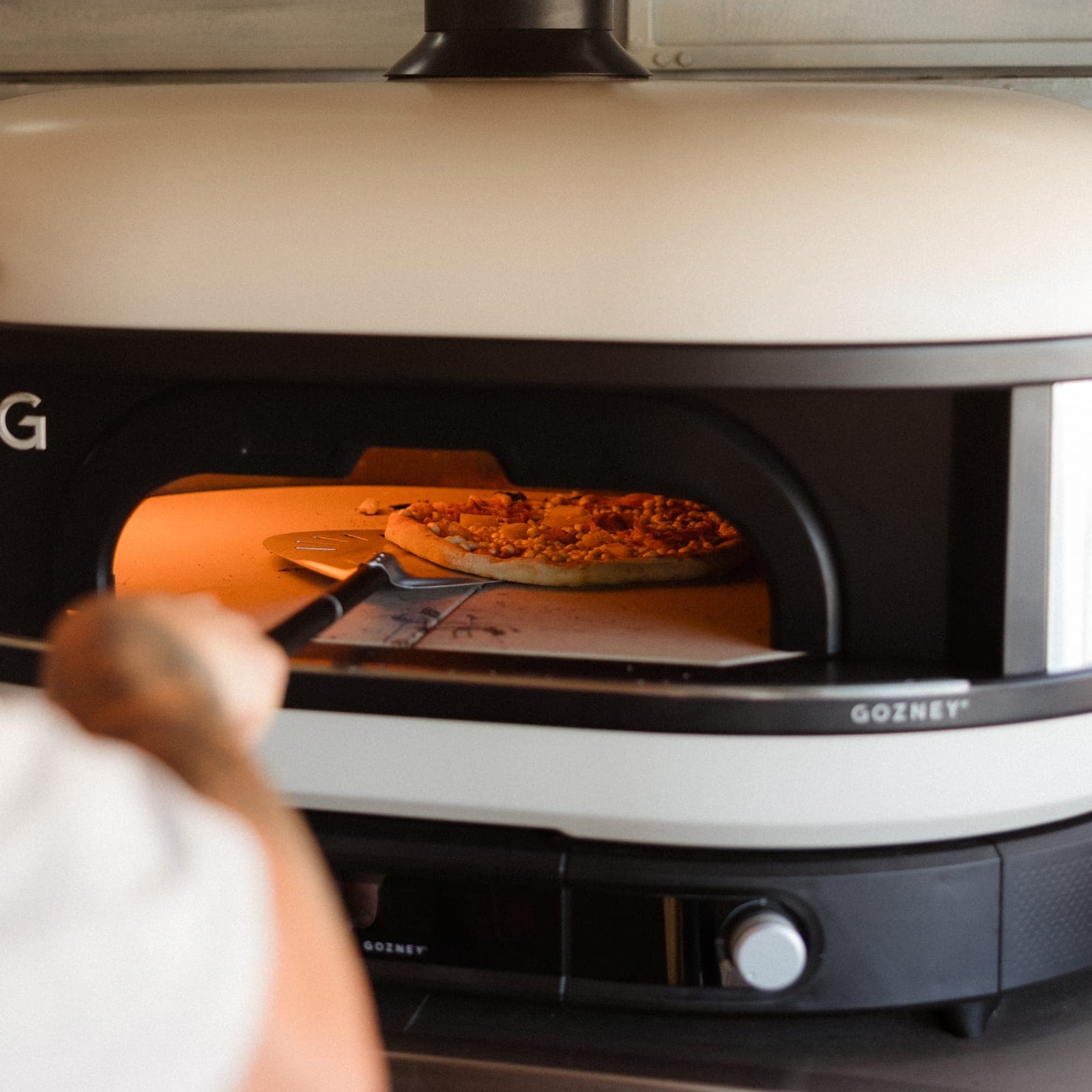 A sourdough pizza cooking in the Gozney oven
